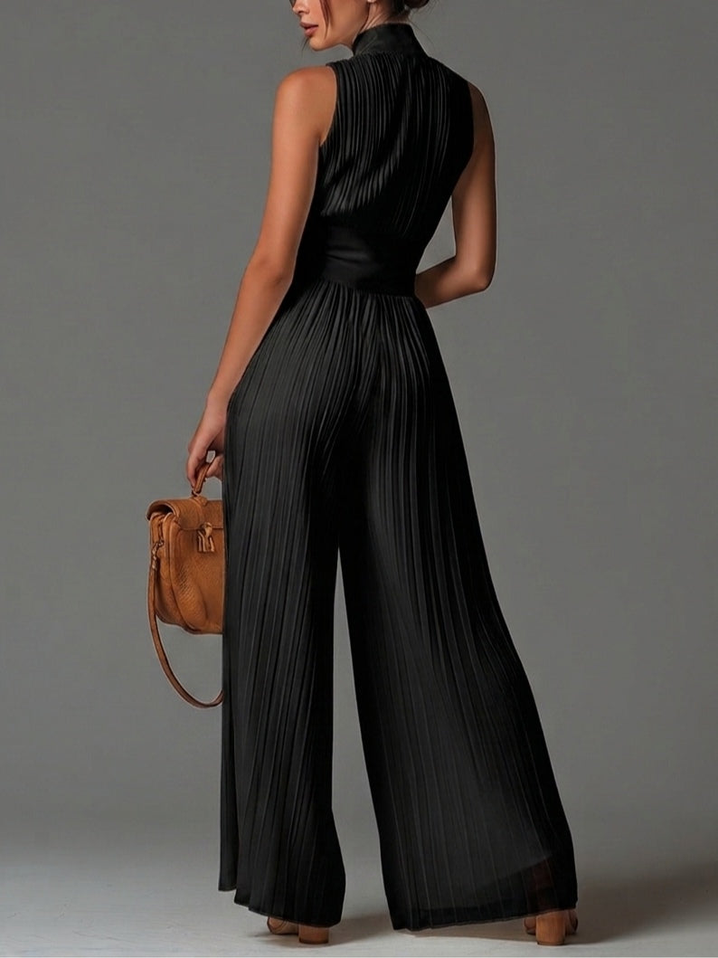 Svart V-ringad ärmlös dragkedja plisserad vidbenad chiffong jumpsuit